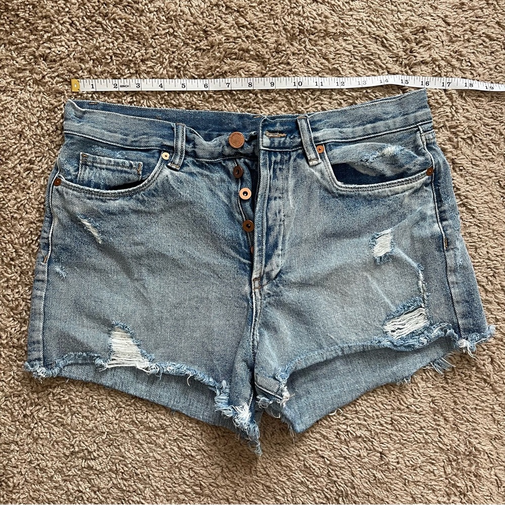 Distressed denim shorts